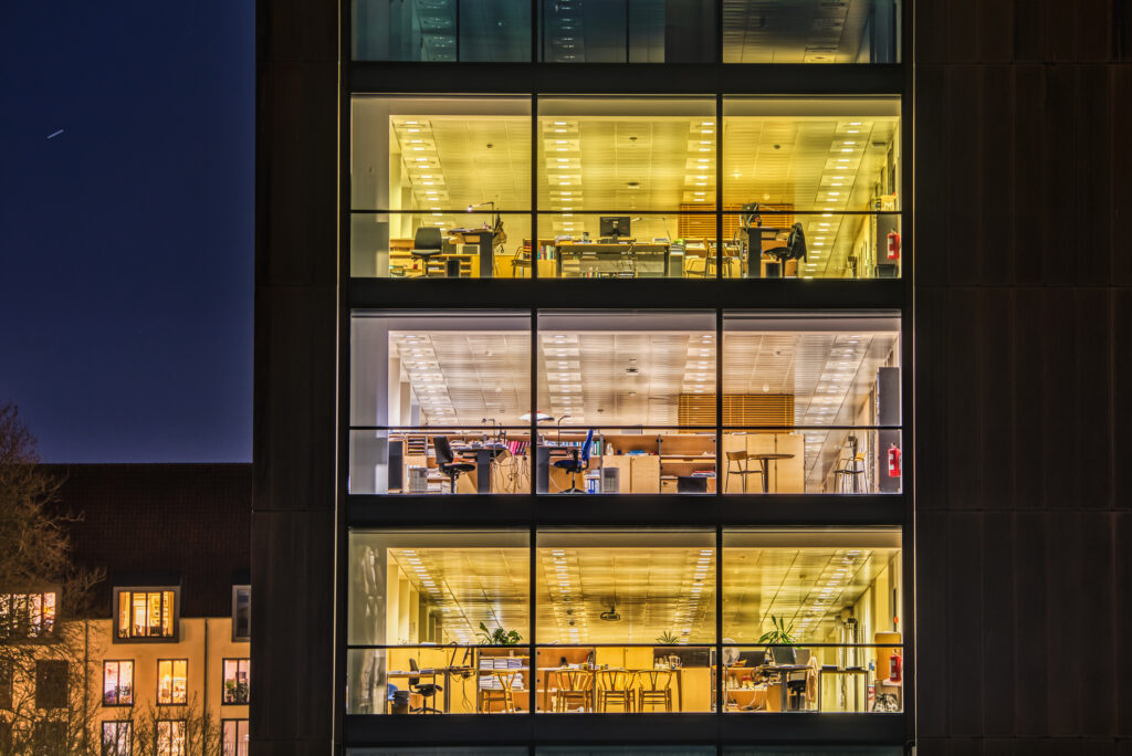 Office glazed facade illuminated