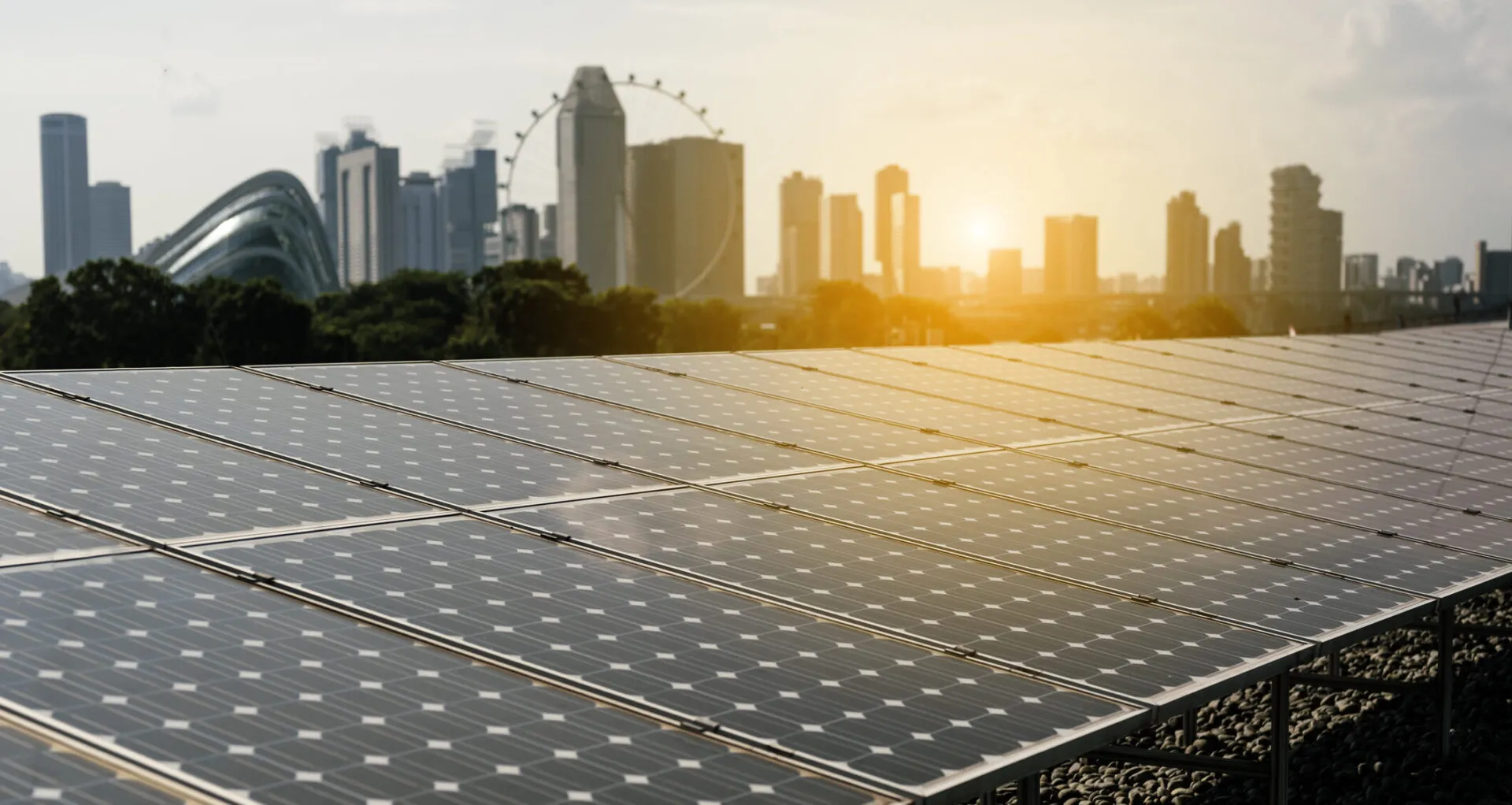 olar panels a under sky with city on horizon.Photovoltaic installations with cityscape on the background.